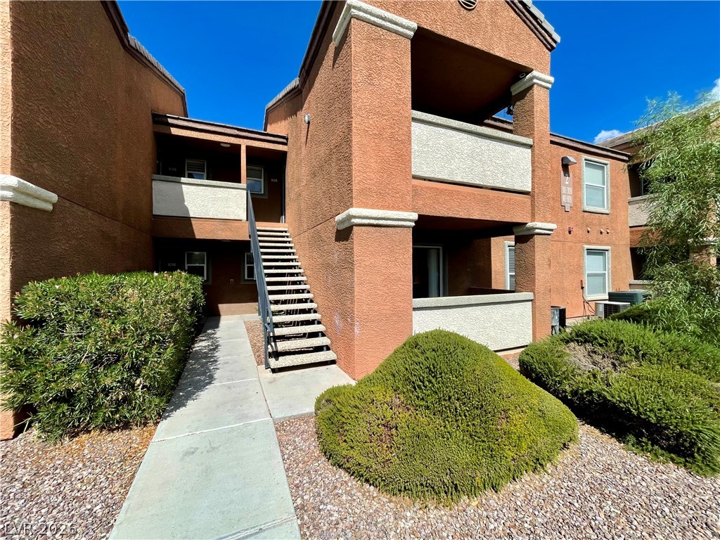 555 East Silverado Ranch Boulevard, Unit 1014 Las Vegas, NV 89183 - Photo 1 of 18 This multi-story complex offers individual balconies and easy stair access, perfect for community living.