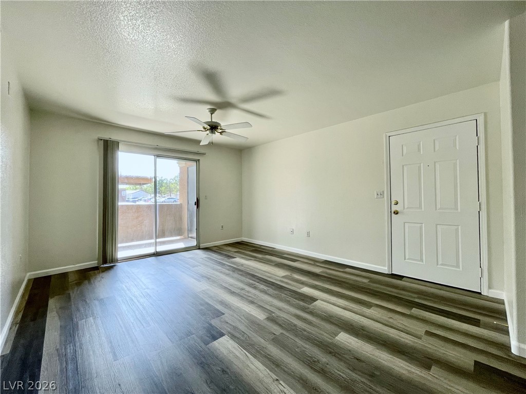 555 East Silverado Ranch Boulevard, Unit 1014 Las Vegas, NV 89183 - Photo 6 of 18 This bright space features sleek flooring and convenient outdoor access.