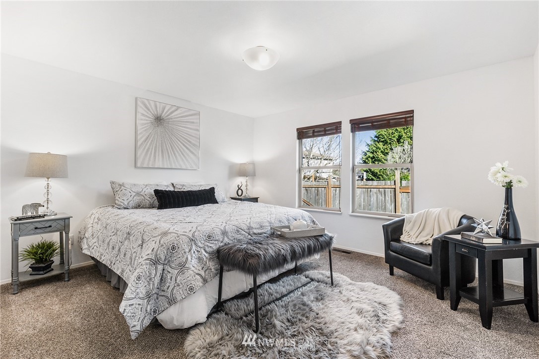 5405 156th Street Southwest Edmonds, WA 98026 - Photo 14 of 27 a bedroom with a bed and a couch