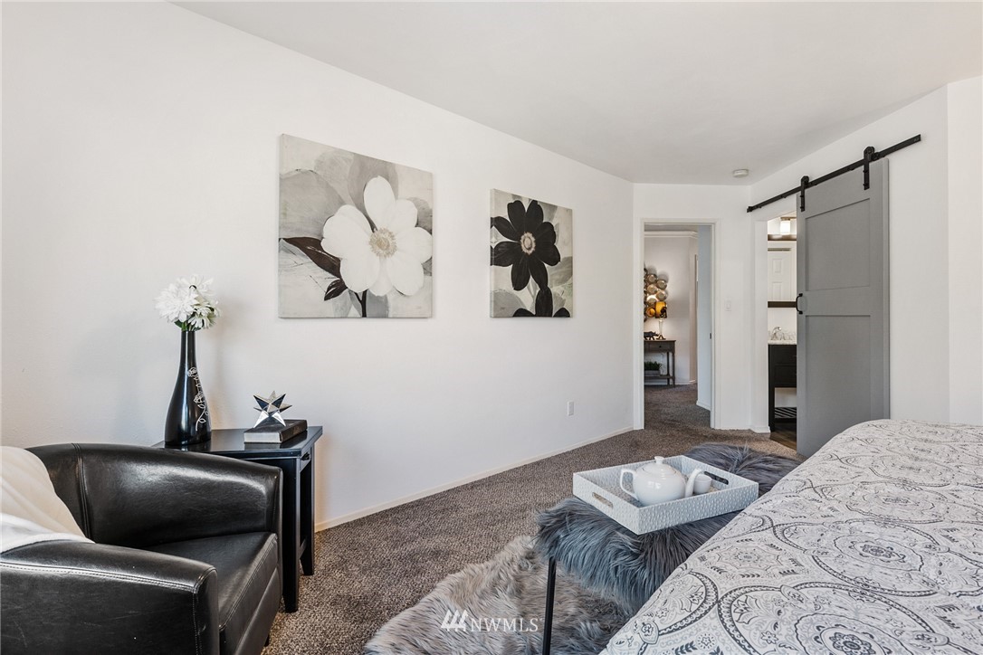 5405 156th Street Southwest Edmonds, WA 98026 - Photo 15 of 27 a bedroom with a bed and furniture