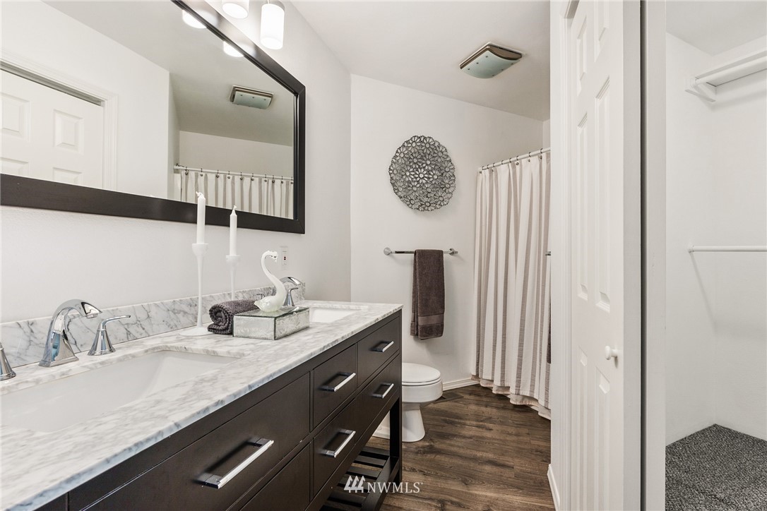 5405 156th Street Southwest Edmonds, WA 98026 - Photo 16 of 27 a bathroom with a sink and a mirror