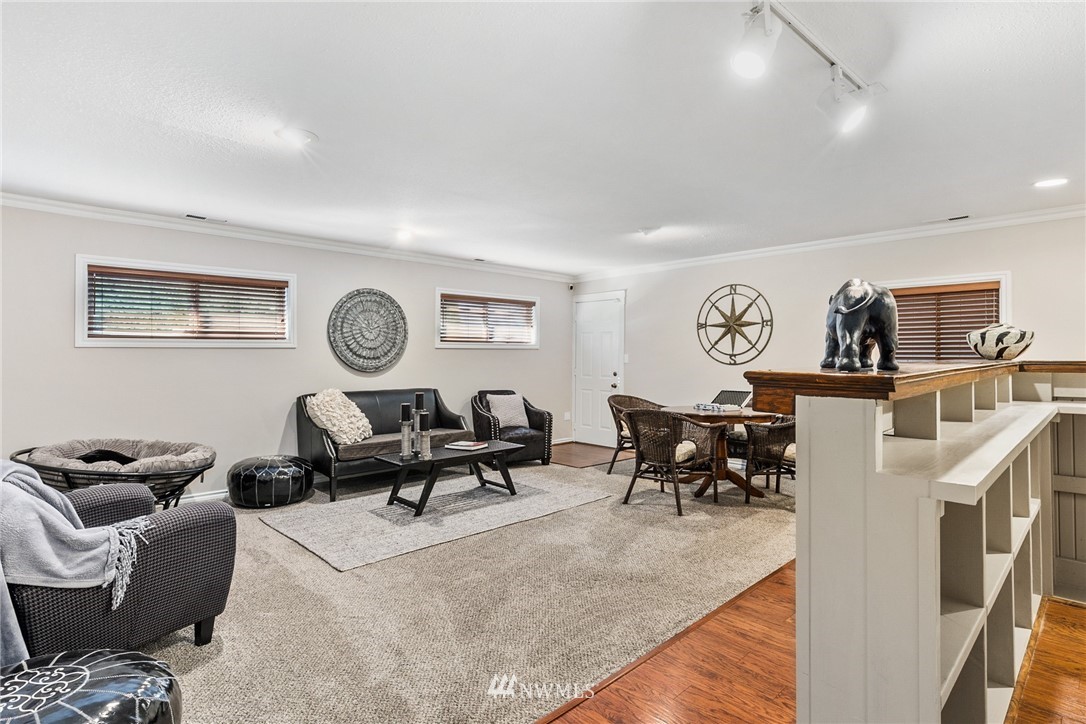 5405 156th Street Southwest Edmonds, WA 98026 - Photo 18 of 27 a living room with furniture and a window