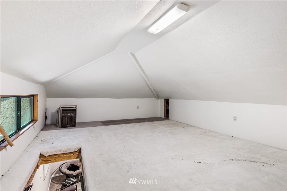 5405 156th Street Southwest Edmonds, WA 98026 - Photo 20 of 27 a view of livingroom with furniture and flat screen tv