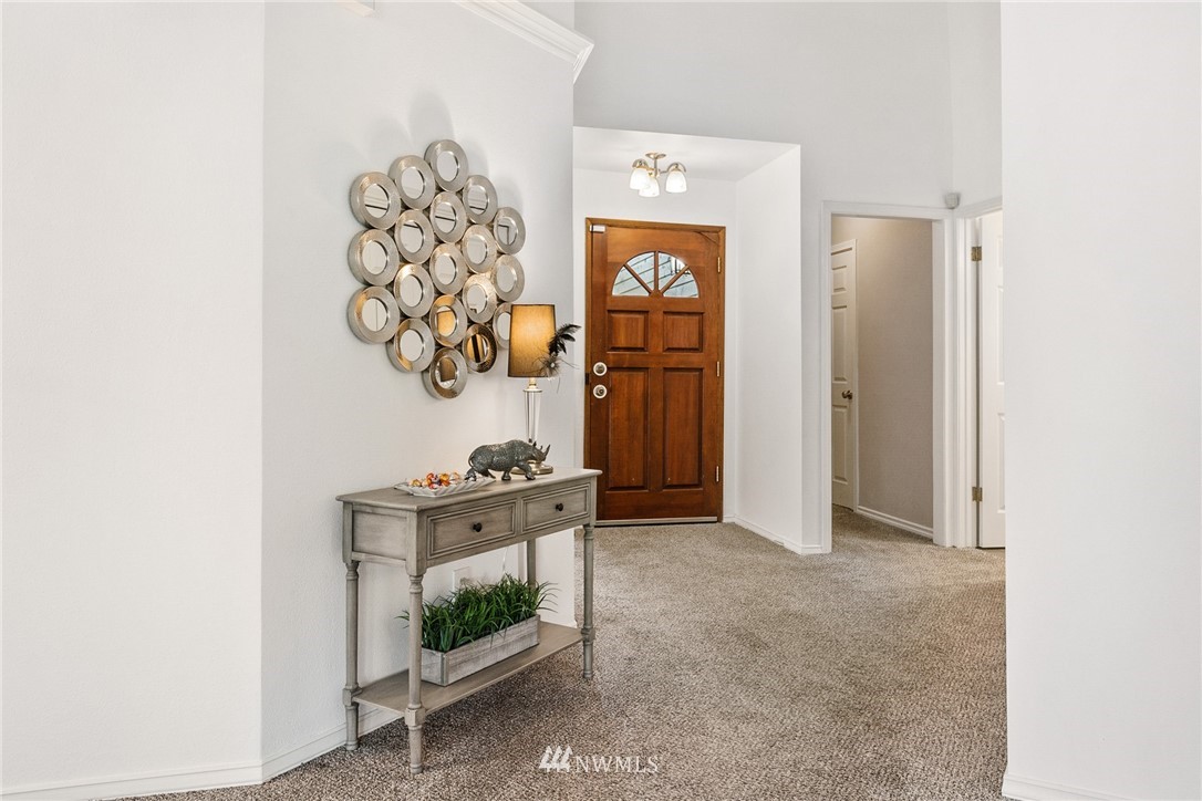 5405 156th Street Southwest Edmonds, WA 98026 - Photo 3 of 27 a view of livingroom with furniture and a fireplace