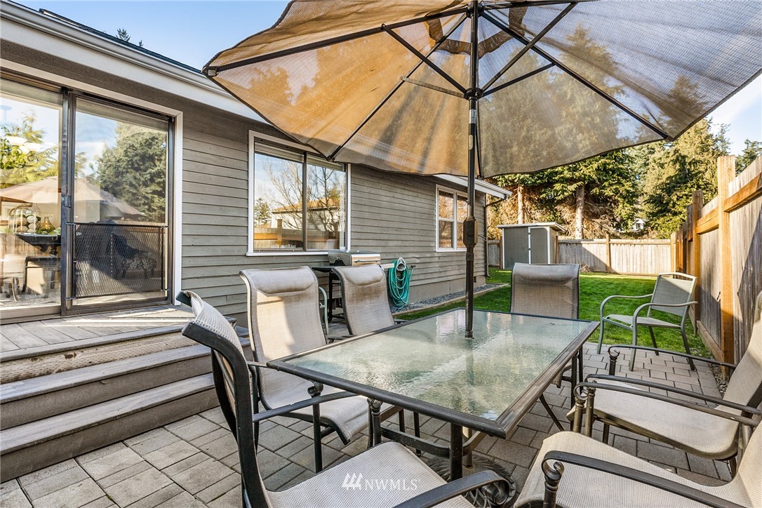 5405 156th Street Southwest Edmonds, WA 98026 - Photo 22 of 27 a view of backyard with outdoor seating and green space