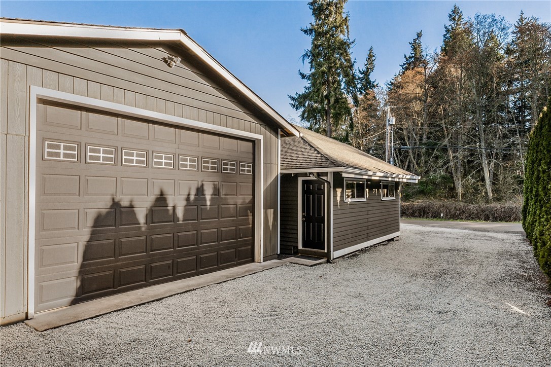 5405 156th Street Southwest Edmonds, WA 98026 - Photo 23 of 27 a front view of a house with garage