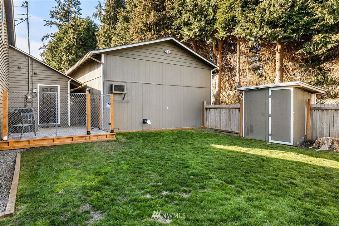 5405 156th Street Southwest Edmonds, WA 98026 - Photo 26 of 27 a front view of house with yard and green space