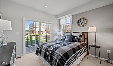 703 Grove Edge Lane, Unit 100 Wake Forest, NC 27587 - Photo 20 of 33 Tessa Bedroom w Balcony