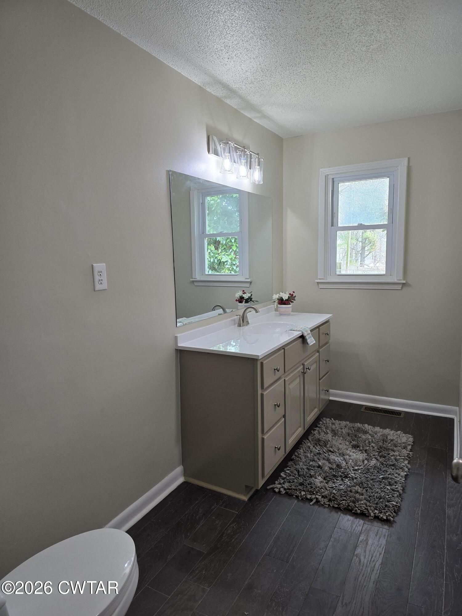 49 Brenda Lane Jackson, TN 38301 - Photo 19 of 23 a utility room with a sink a washer and dryer