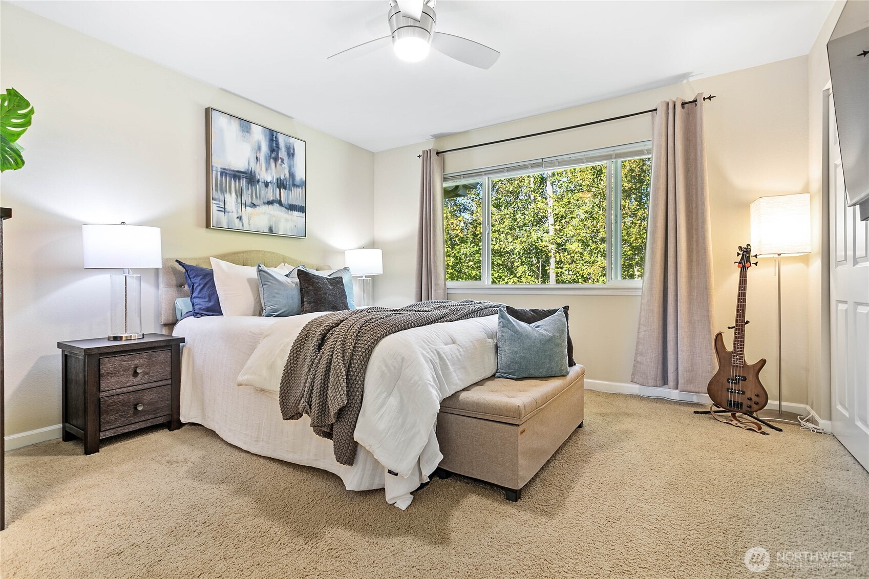 1384 Bayview Court, Unit E1 Blaine, WA 98230 - Photo 19 of 33 a bed room with a bed and a couch