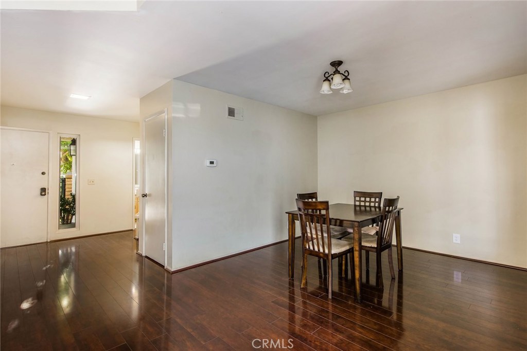 43 Morena Irvine, CA 92612 - Photo 13 of 42 a view of a dining room with furniture and wooden floor