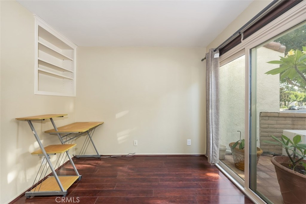 43 Morena Irvine, CA 92612 - Photo 21 of 42 a view of a room that has a window and wooden floor