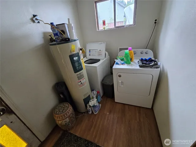 a utility room with dryer and washer