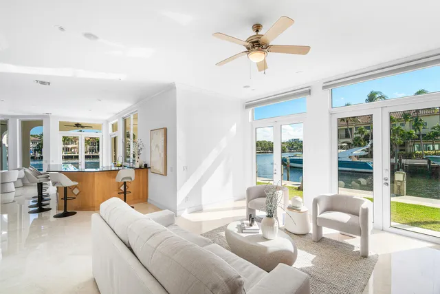 a bathroom with double sink and a mirror