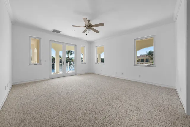 a view of a white building among the street