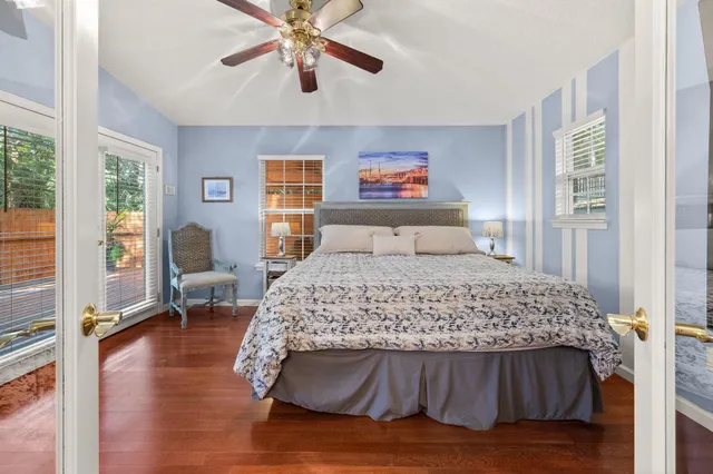 a bedroom with furniture and a window