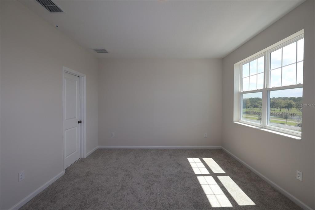 5204 Ctr Lk Rnch Boulevard St. Cloud, FL 34771 - Photo 14 of 24 a view of an empty room and window