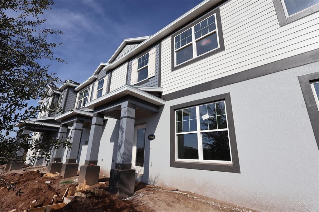5204 Ctr Lk Rnch Boulevard St. Cloud, FL 34771 - Photo 2 of 24 a front view of a house