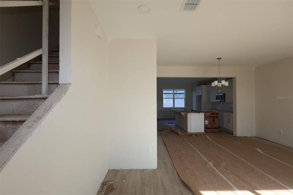 5204 Ctr Lk Rnch Boulevard St. Cloud, FL 34771 - Photo 6 of 24 a view of a living room and bathroom