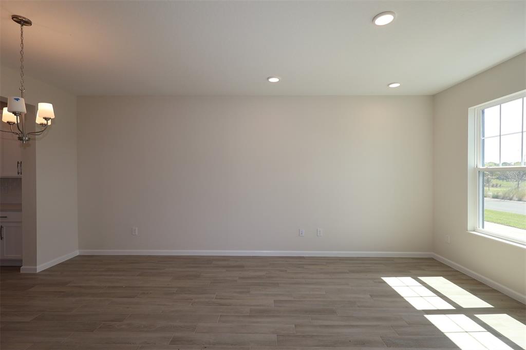 5204 Ctr Lk Rnch Boulevard St. Cloud, FL 34771 - Photo 7 of 24 a view of an empty room and window