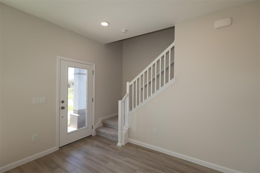 5204 Ctr Lk Rnch Boulevard St. Cloud, FL 34771 - Photo 8 of 24 a view of an entryway with wooden floor