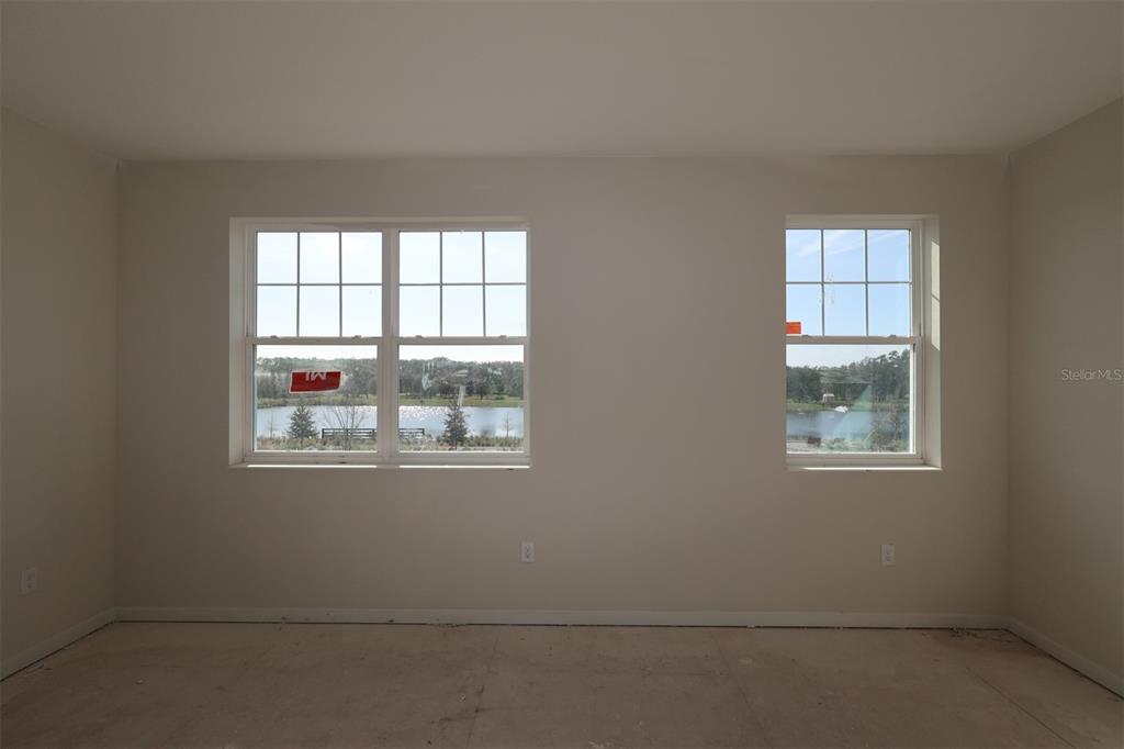 5204 Ctr Lk Rnch Boulevard St. Cloud, FL 34771 - Photo 10 of 24 an empty room with windows