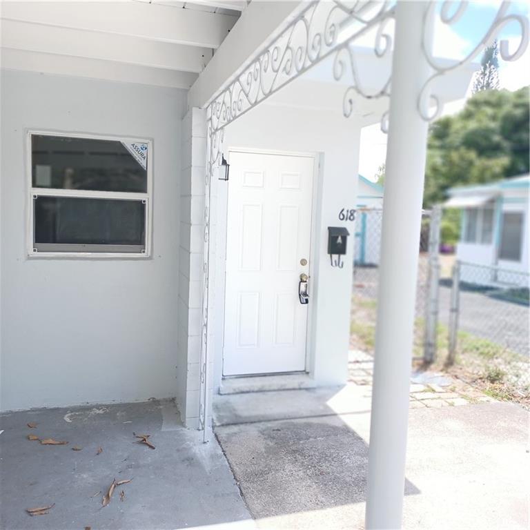 618 58th Street, Unit A West Palm Beach, FL 33407 - Photo 1 of 6 a view of a bathroom with a outdoor space