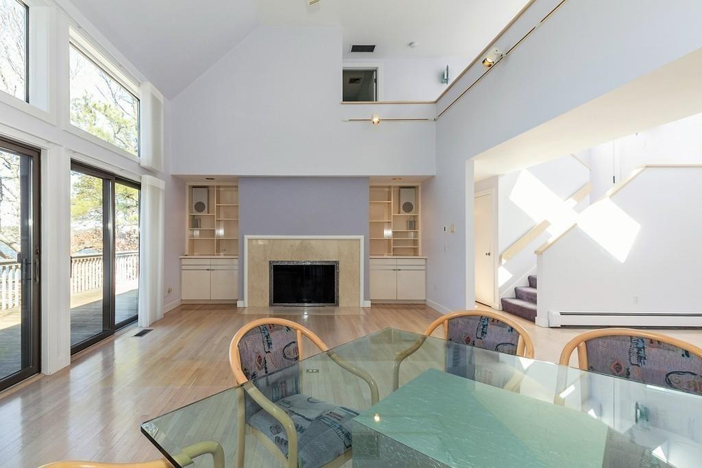 94 Summersea Road Mashpee, MA 02649 - Photo 8 of 25 a living room with furniture and a fireplace