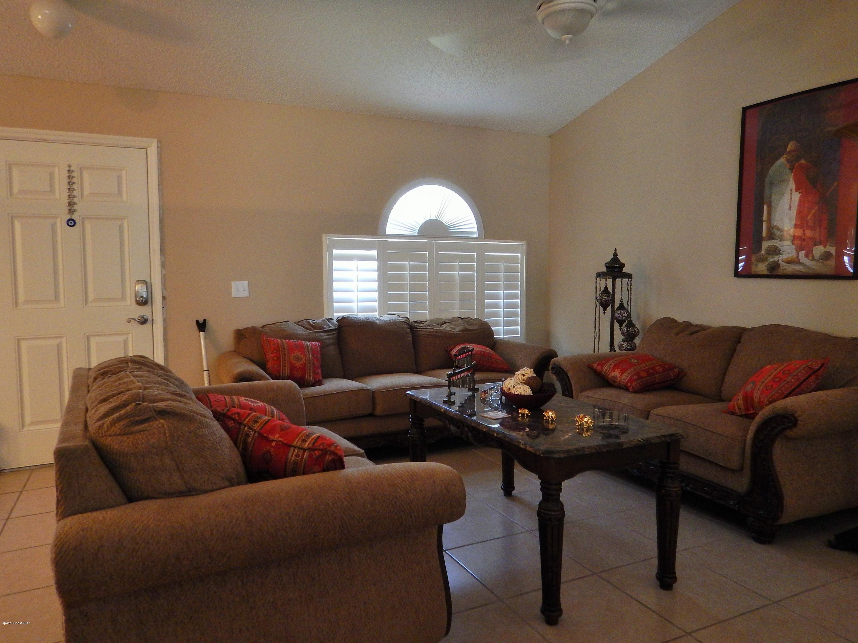 185 Benchor Road Northwest Palm Bay, FL 32907 - Photo 11 of 25 Formal Living Room