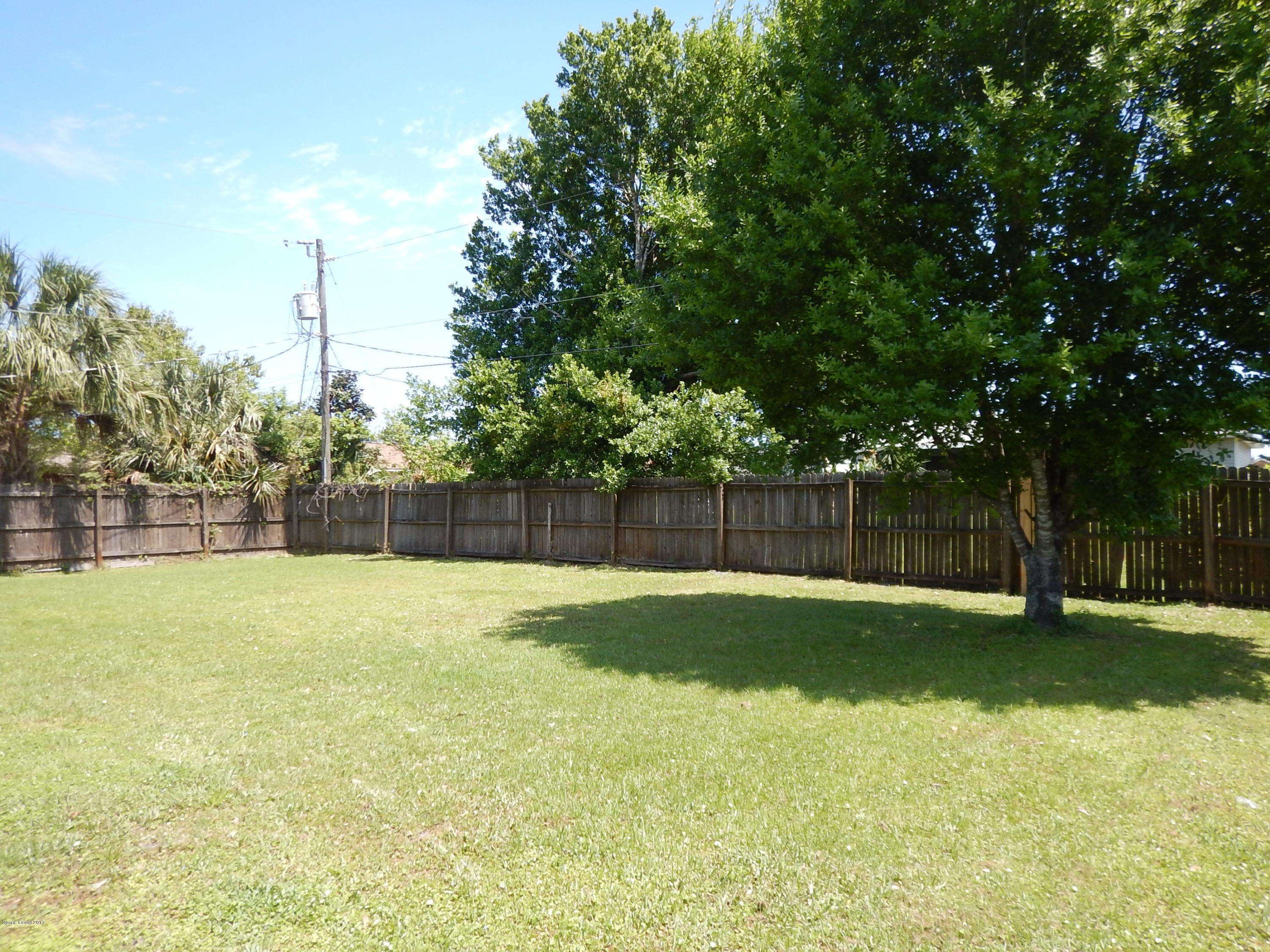 185 Benchor Road Northwest Palm Bay, FL 32907 - Photo 20 of 25 Fenced Backyard