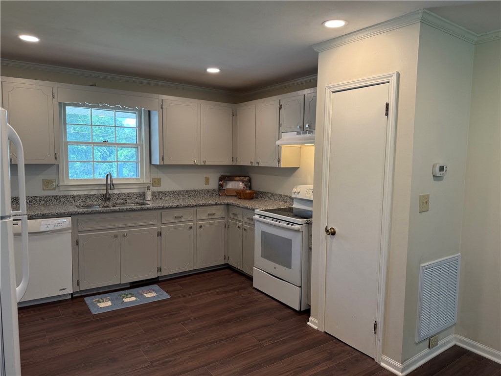 1507 East Calhoun Street Anderson, SC 29621 - Photo 6 of 18 A well-equipped culinary space awaits with extensive counter space and modern appliances.