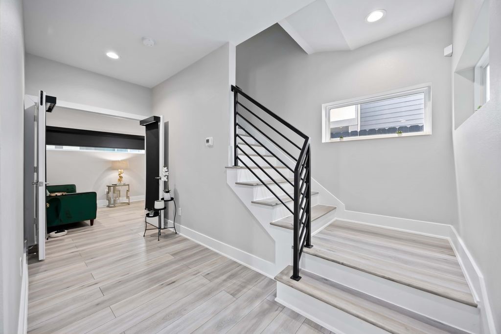 705 Gregg Street Houston, TX 77020 - Photo 17 of 27 a view of entryway with wooden floor