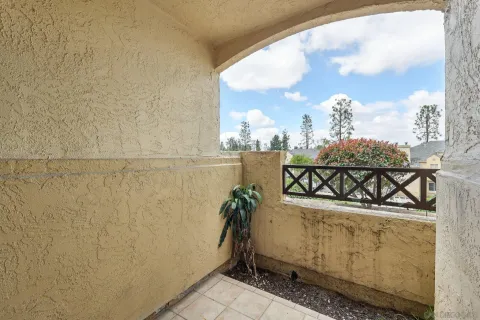 a house view with outdoor space and garden