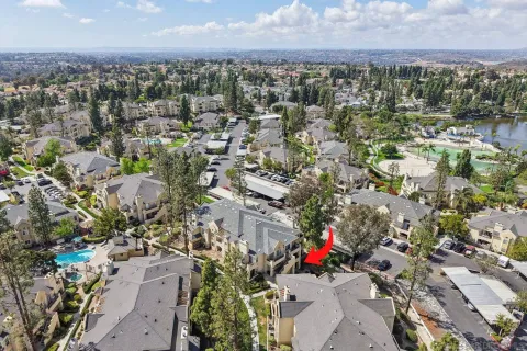 a view of a chairs and table in the patio