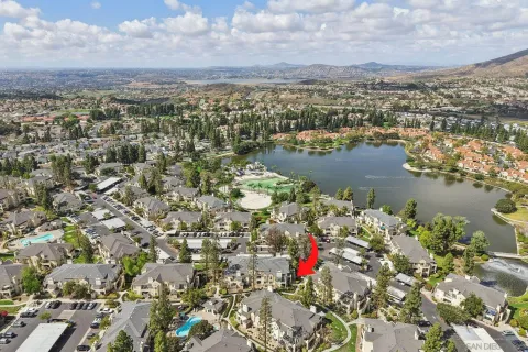 a view of a lake with a city