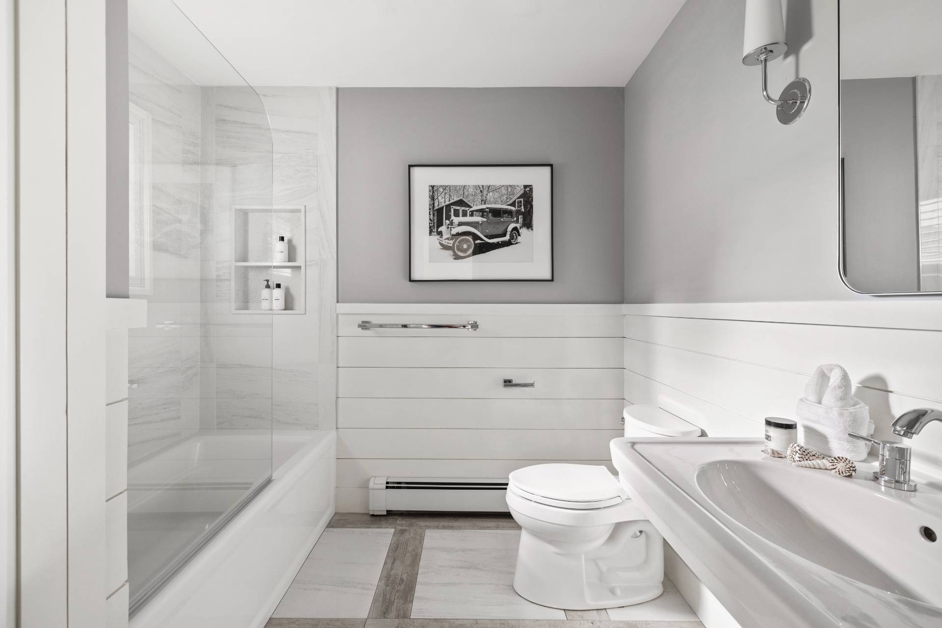 14 Sunset Road Sag Harbor, NY 11963 - Photo 11 of 19 a bathroom with a toilet a sink and bathtub