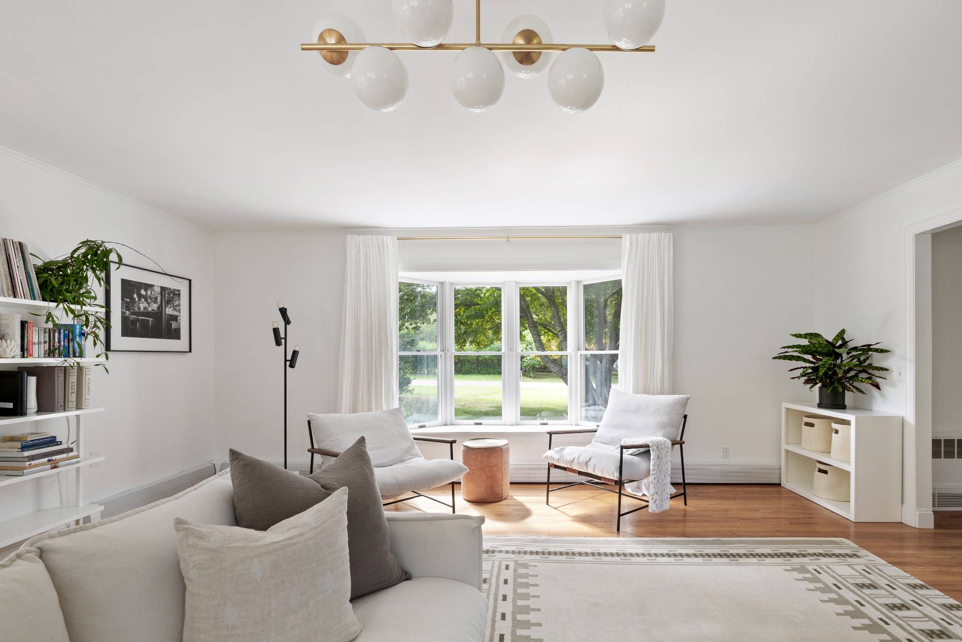 14 Sunset Road Sag Harbor, NY 11963 - Photo 4 of 19 a living room with furniture and a large window