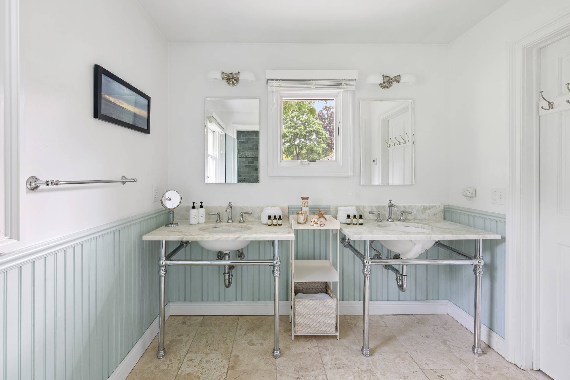 14 Sunset Road Sag Harbor, NY 11963 - Photo 8 of 19 a view of a room that has a table and chairs in it