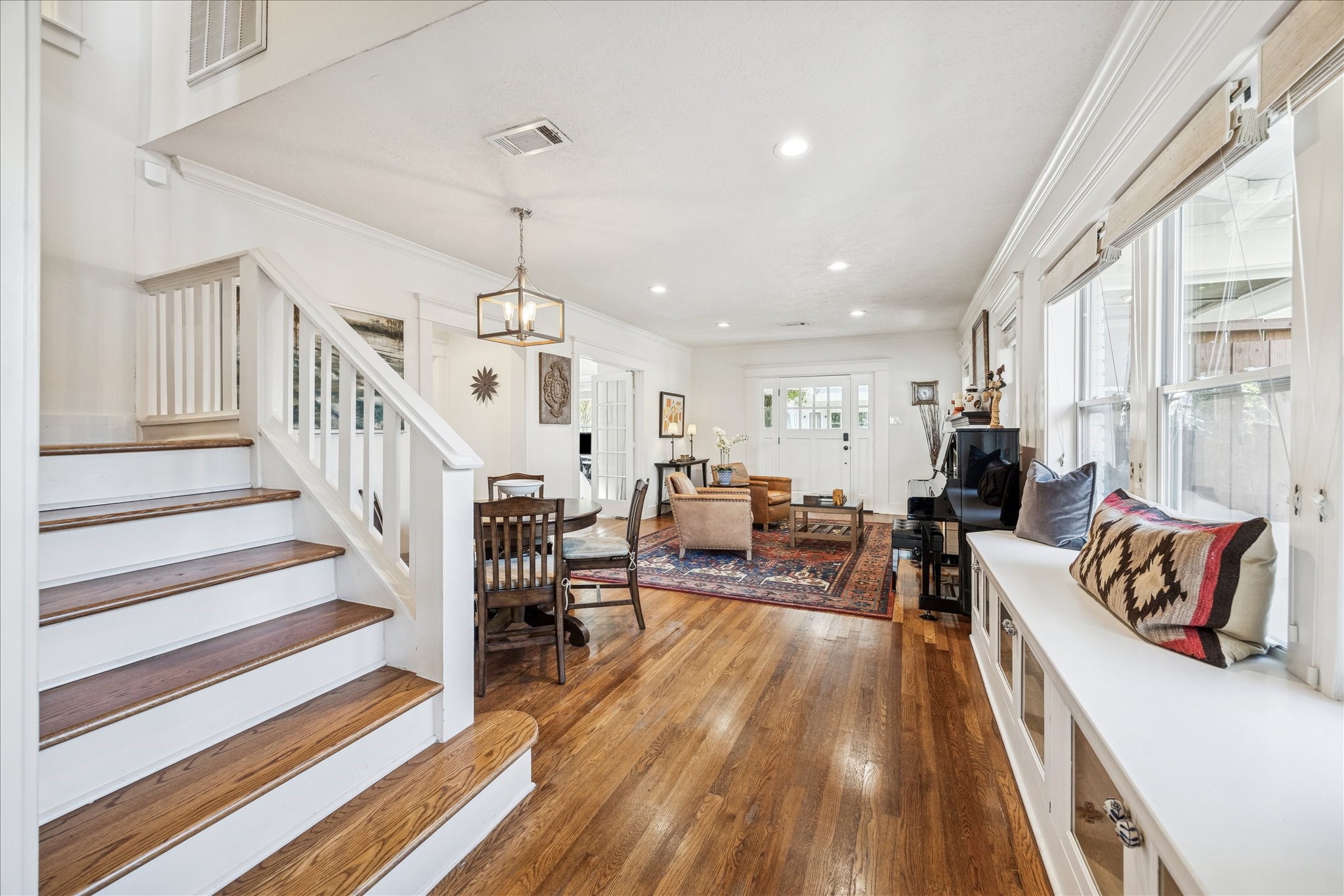 825 Merrill Street Houston, TX 77009 - Photo 37 of 37 Spacious open floor plan featuring living, dining, and kitchen areas that flow effortlessly, perfect for gatherings.