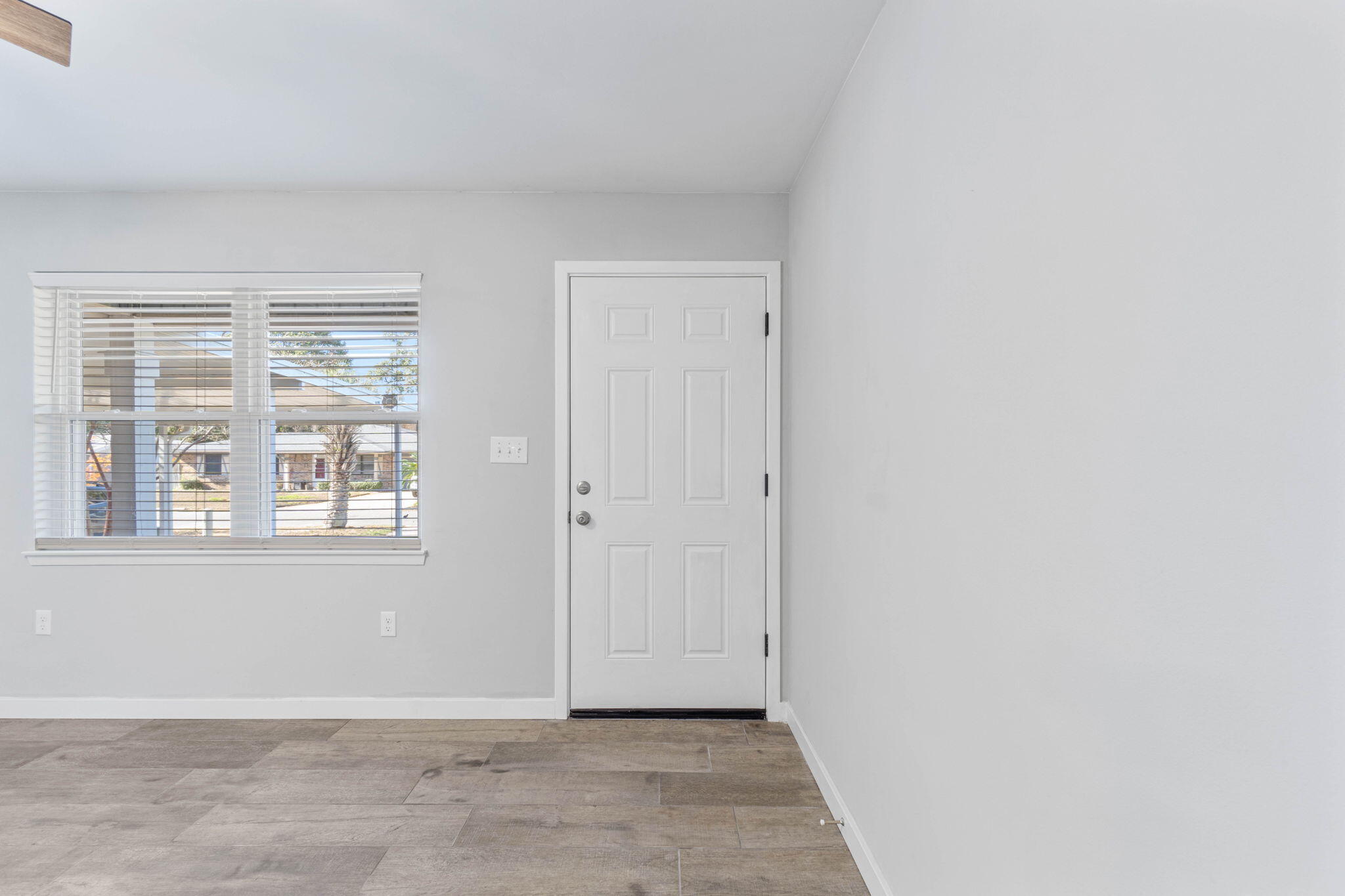 14 9th Street Shalimar, FL 32579 - Photo 4 of 29 a view of an empty room with a window