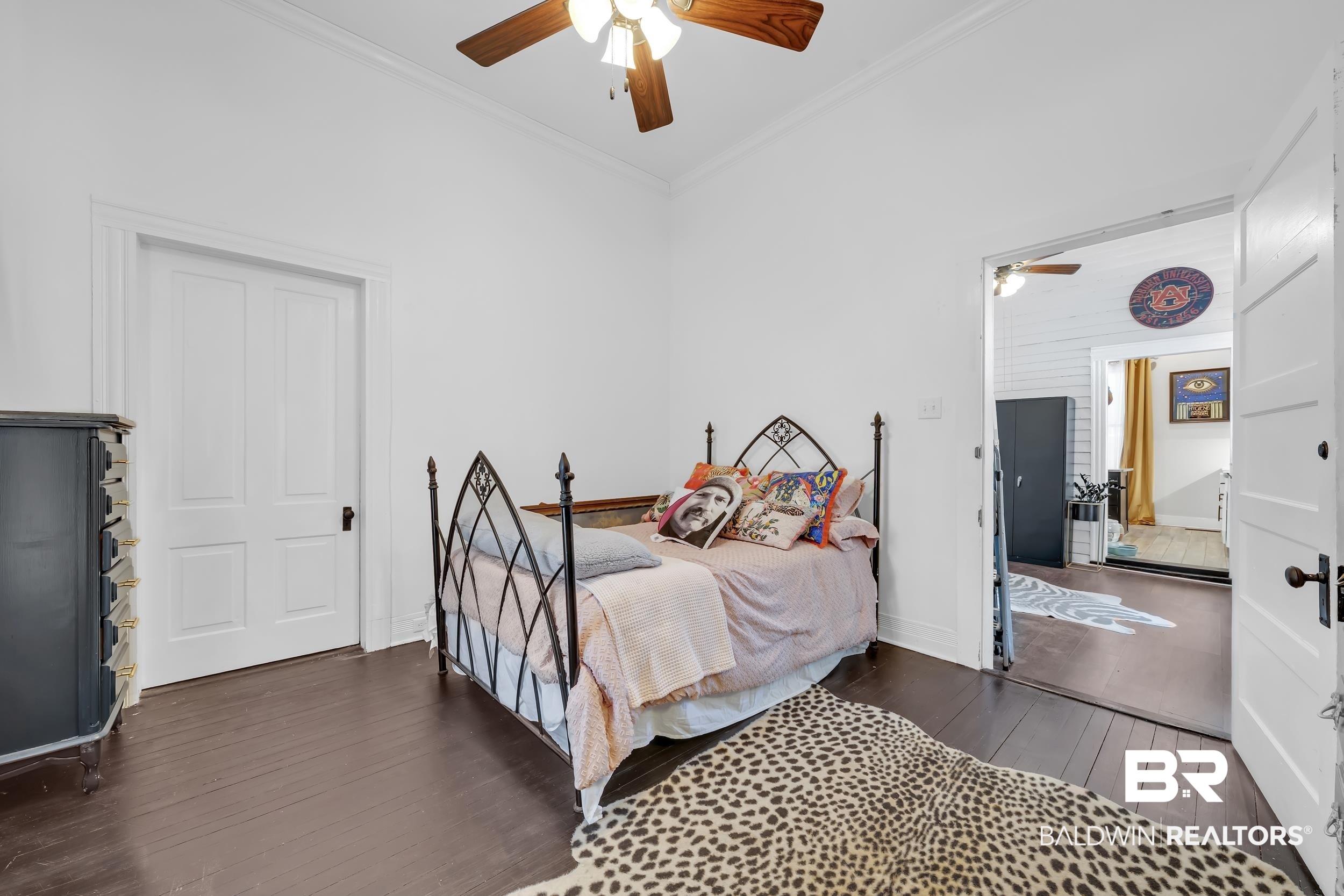 1322 Dauphin Street Mobile, AL 36604 - Photo 16 of 21 Bedroom featuring dark wood finished floors, crown molding, and a ceiling fan