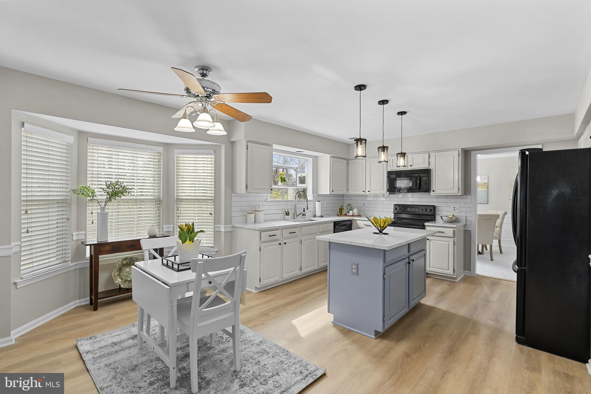 3 Moss Road Sterling, VA 20165 - Photo 23 of 77 Eat-In Kitchen Area w New LVP, Paint, Quartz Ctops