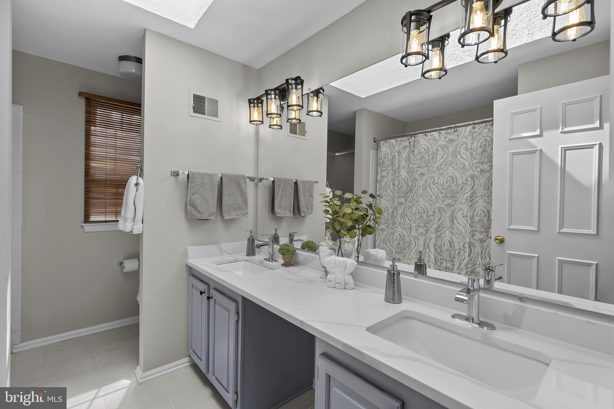 3 Moss Road Sterling, VA 20165 - Photo 47 of 77 Remodeled UL Full BA w/ Sep Tub + Shower, Quartz