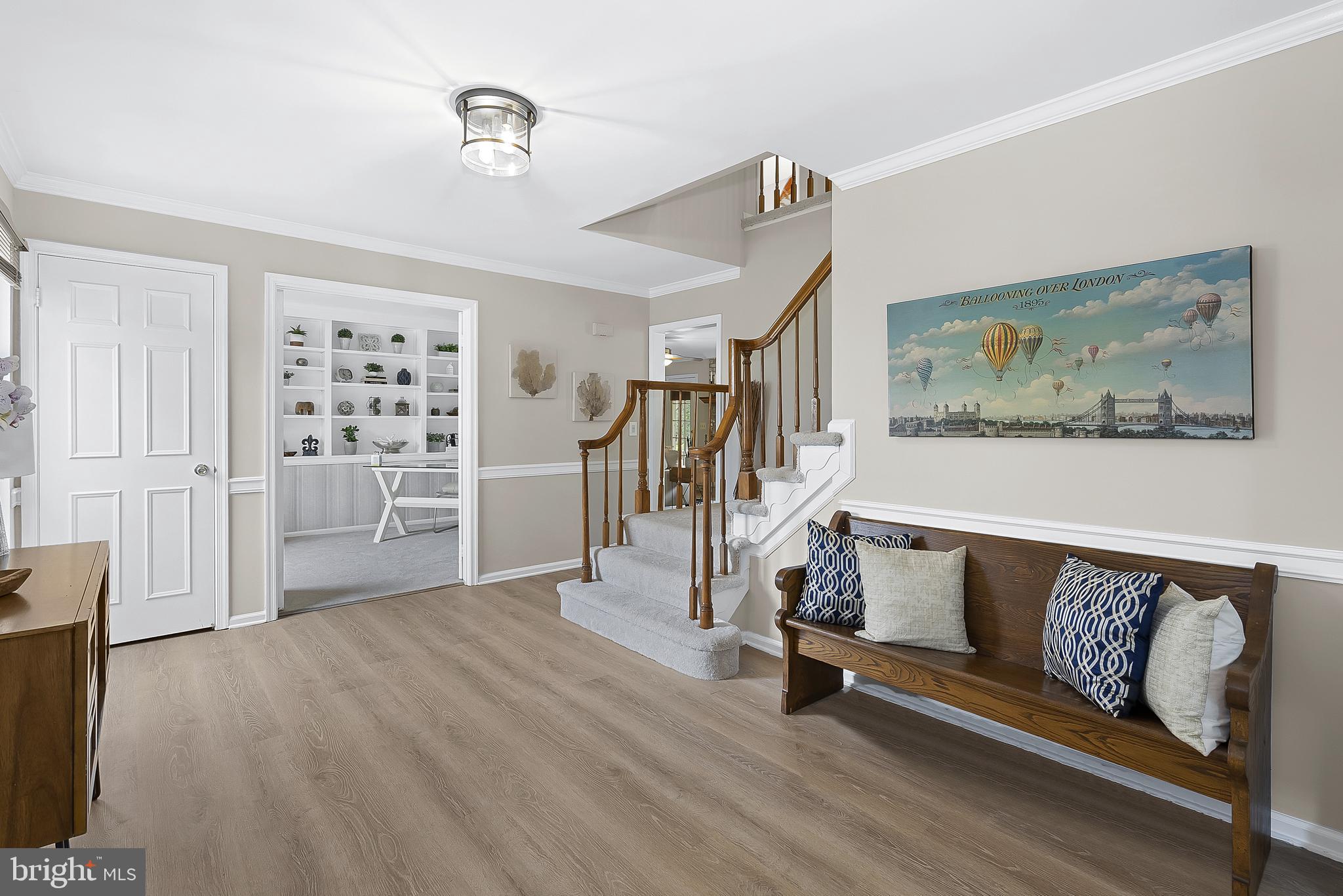 3 Moss Road Sterling, VA 20165 - Photo 8 of 77 Welcoming Foyer w/ New LVP