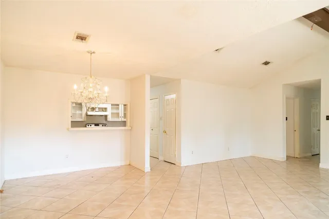 a view of a kitchen with a sink