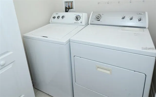 a view of a hallway with front door
