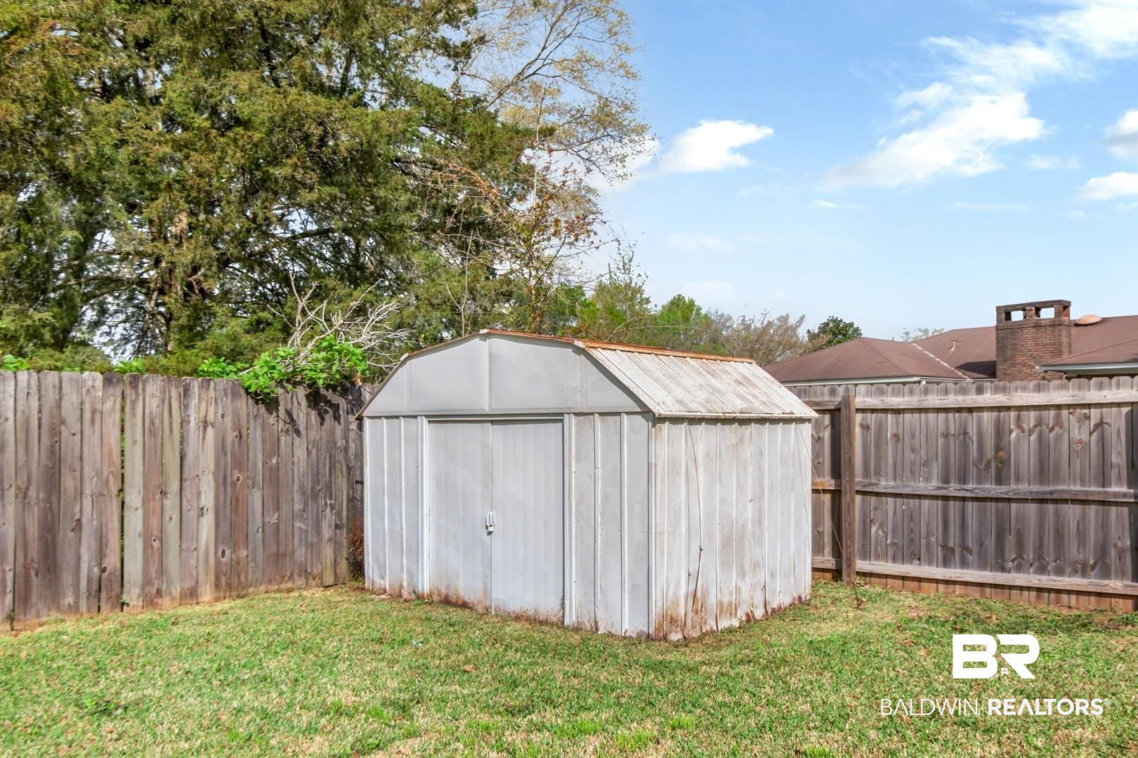 6208 Cottage Hill Road Mobile, AL 36609 - Photo 20 of 20 View of shed featuring a fenced backyard