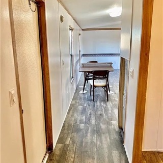 360 County Road 462 Elgin, TX 78621 - Photo 2 of 13 a view of a hallway with wooden floor and stairs