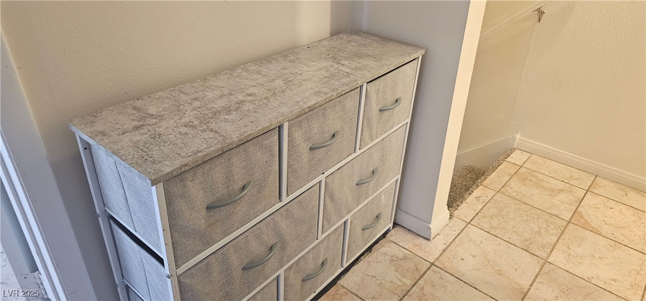 1344 Lorilyn Avenue, Unit 2 Las Vegas, NV 89119 - Photo 12 of 15 Detailed view of a textured wall and baseboards