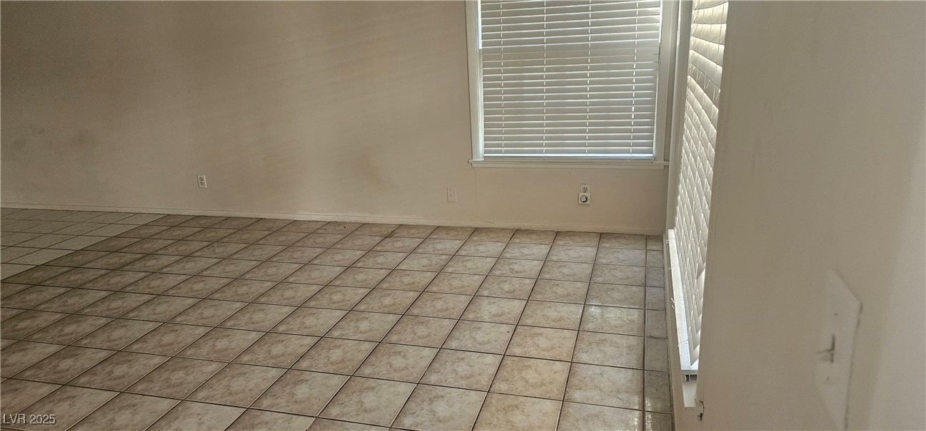 1344 Lorilyn Avenue, Unit 2 Las Vegas, NV 89119 - Photo 5 of 15 View of tiled spare room